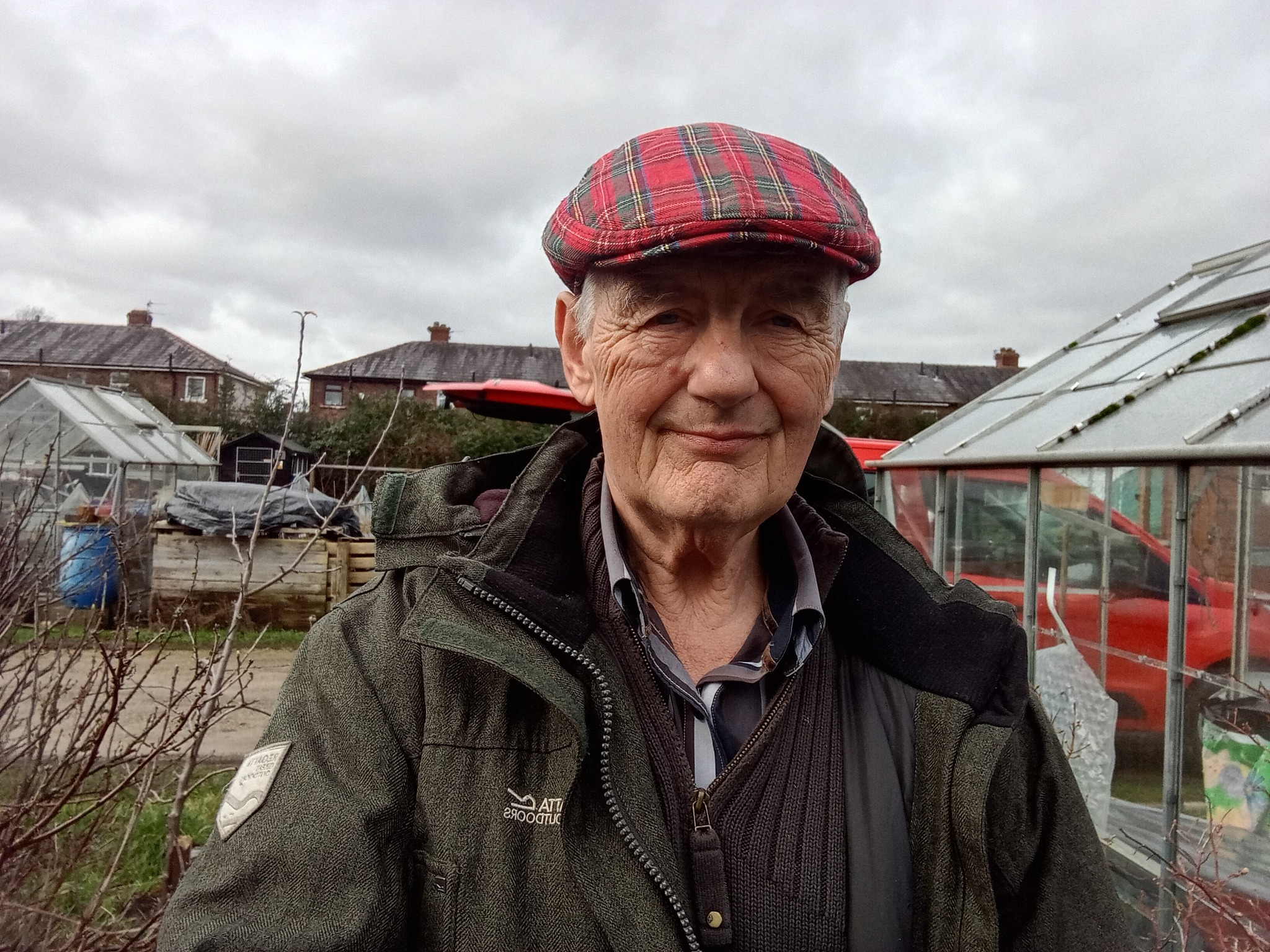 Dave in his tartan cap at his allotment