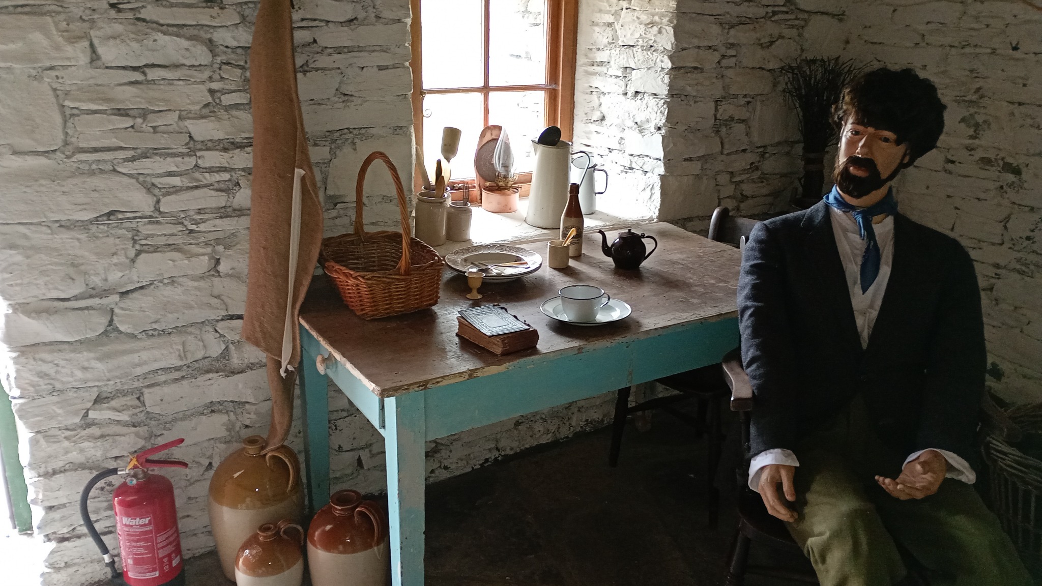 A recreated domestic scene inside the heritage cottage